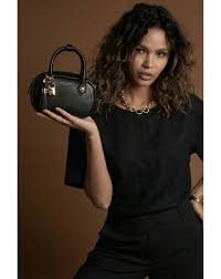 riquetfashion Women's Black Mini Handbag with Gold-Tone Charms